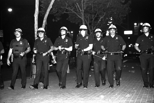 Riot police line